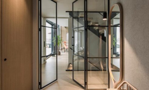 The Elegance of Glass Doors in Hotel Rooms: A Guide to Interior Design